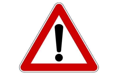 Warndreieck mit Ausrufezeichen in der Mitte